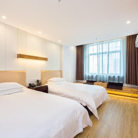 Omeiga Business Hotel อี้วู ภายนอก รูปภาพ
