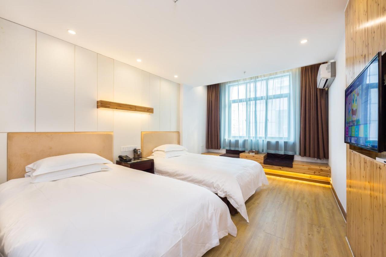 Omeiga Business Hotel อี้วู ภายนอก รูปภาพ